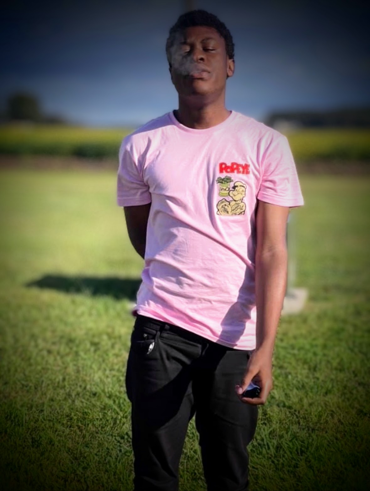 JayHBK outdoors in a pink shirt